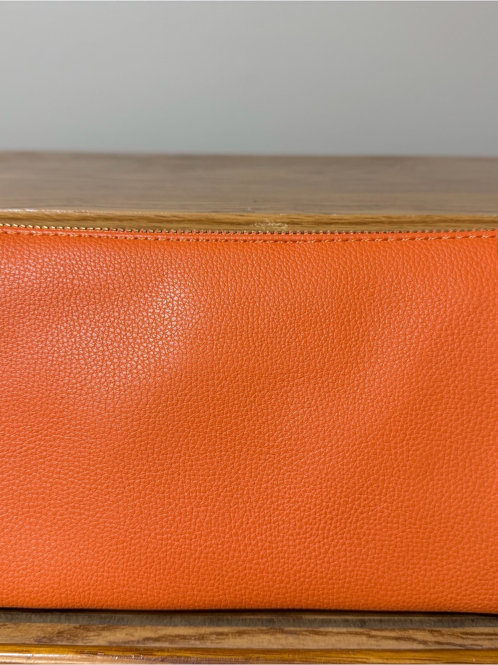 Pebbled Orange Crossbody Bag with Gold Zip